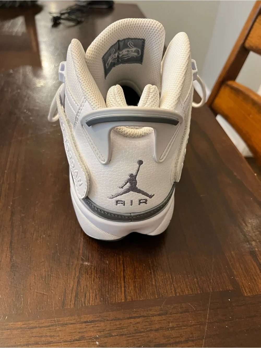 Jordan Kids High-Top Sneakers in White and Grey Patent